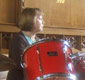 Judith playing the drums in Church